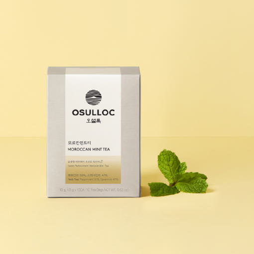 Boîte de thé Moroccan Mint OSULLOC blanc et beige avec feuilles de menthe fraîche.