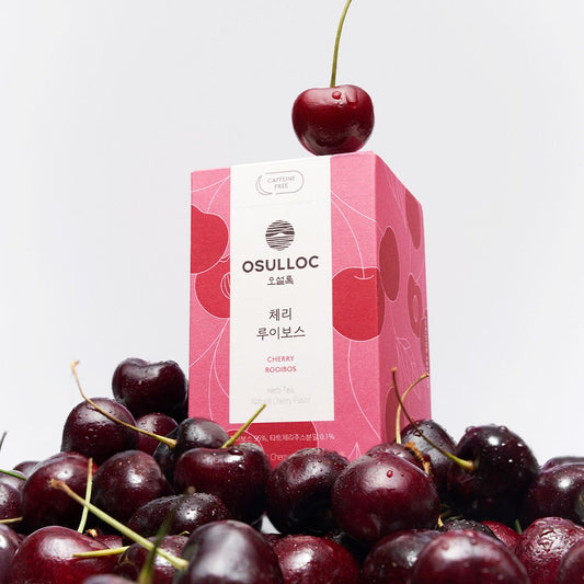 Boîte rose OSULLOC Cherry Rooibos avec des cerises fraîches 