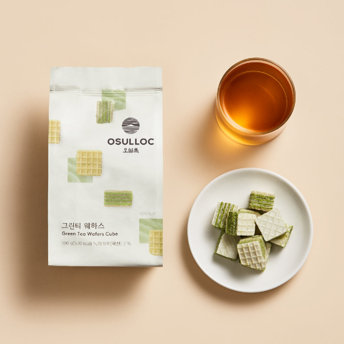 boite ossuloc avec tea wafers et tasse de the
