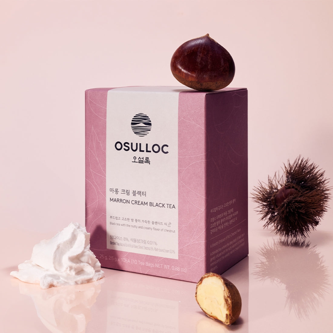 Boîte rose poudré OSULLOC Marron Cream Black Tea avec des visuels de marrons entiers et de crème onctueuse.