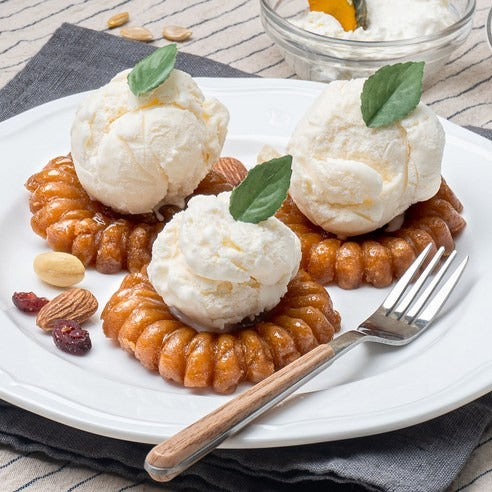une presentation de Yakgwa Artisanal au Potiron et Miel pour un dessert